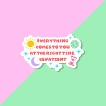 Load image into Gallery viewer, A sticker with the following quote &quot;everything comes to you at the right time. Be patient&quot;. the sticker has stars sprinkled around, a depiction of the sun and moon on one side and a classic clock and an hour glass on the other side
