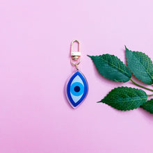 Load image into Gallery viewer, This is a blue Evil Eye Keychain with a gold polished swivel clasp

