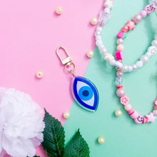 Load image into Gallery viewer, This is a blue Evil Eye Keychain with a gold polished swivel clasp
