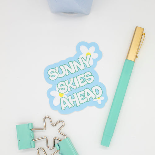 Flat lay of sunny skies ahead sticker
