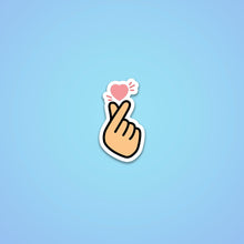 Load image into Gallery viewer, This is a picture of a korean finger heart with tan skin fingers and the pink heart 
